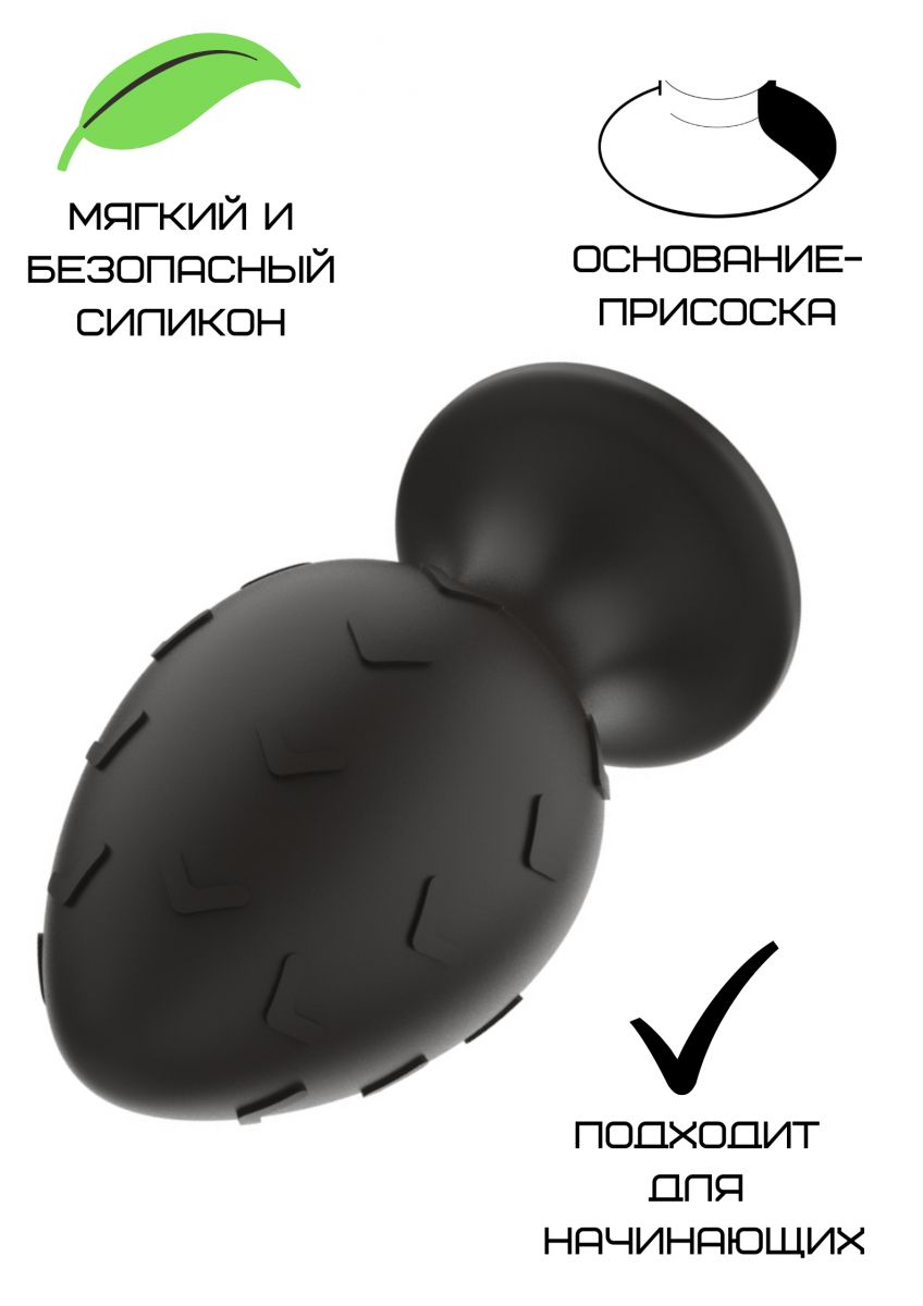 Черная средняя силиконовая анальная пробка с рельефом в виде галочек 2