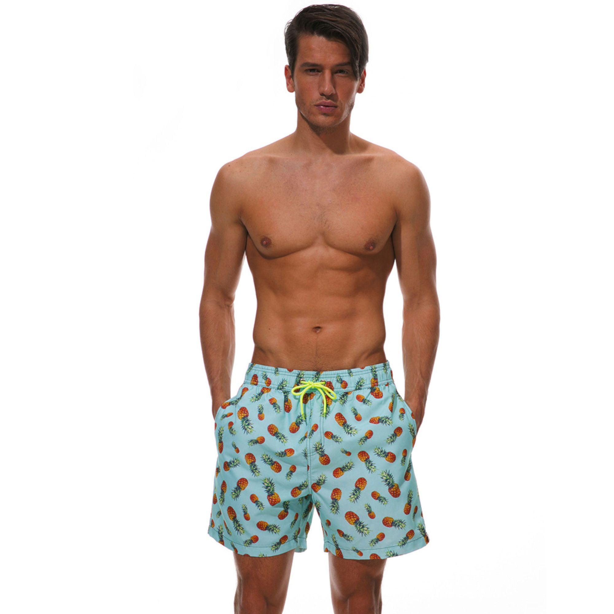 Голубые пляжные шорты с ананасами 4