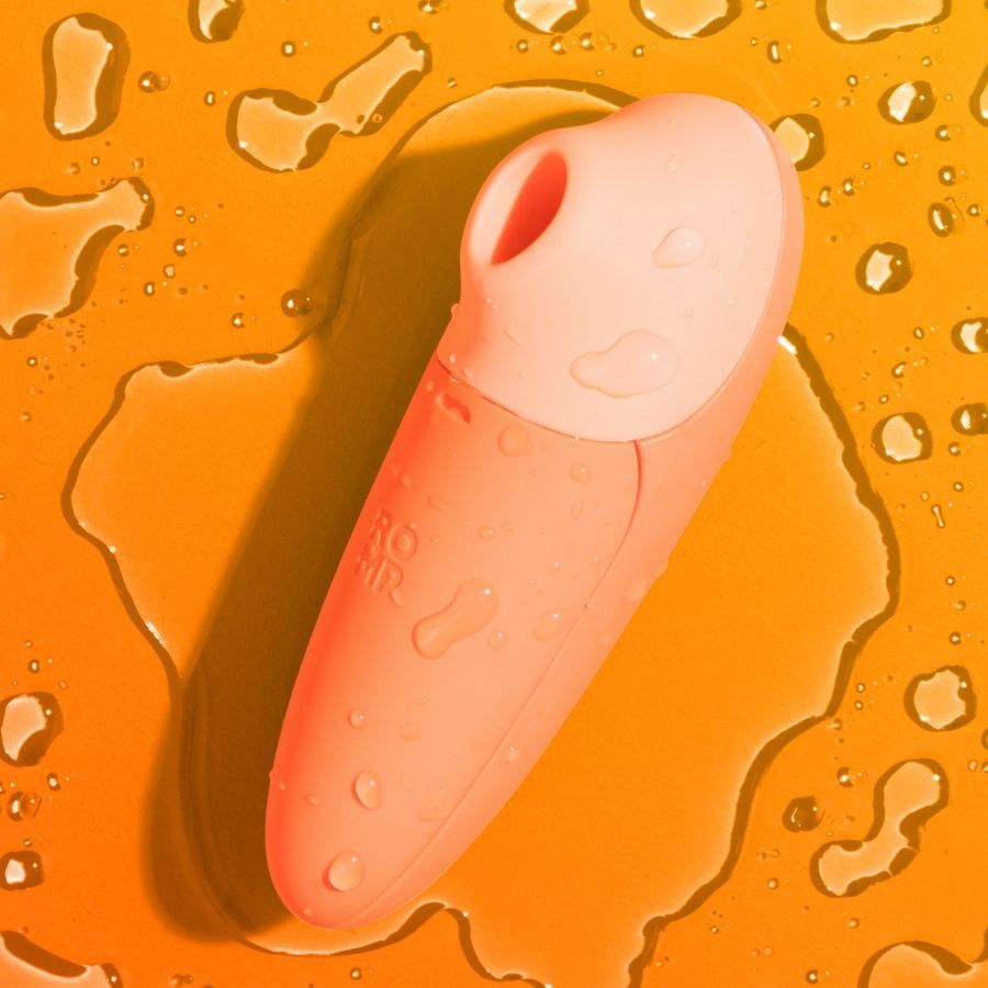 Оранжевый бесконтактный клиторальный стимулятор Romp Switch X 3