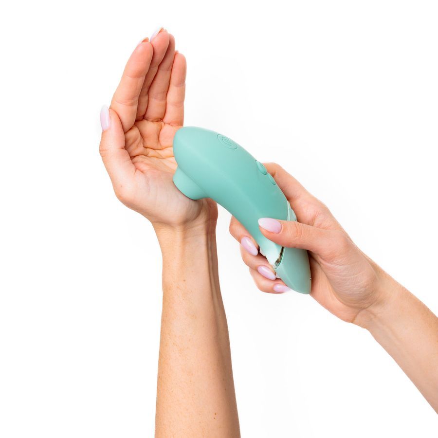 Зеленый бесконтактный клиторальный стимулятор Womanizer Next 7