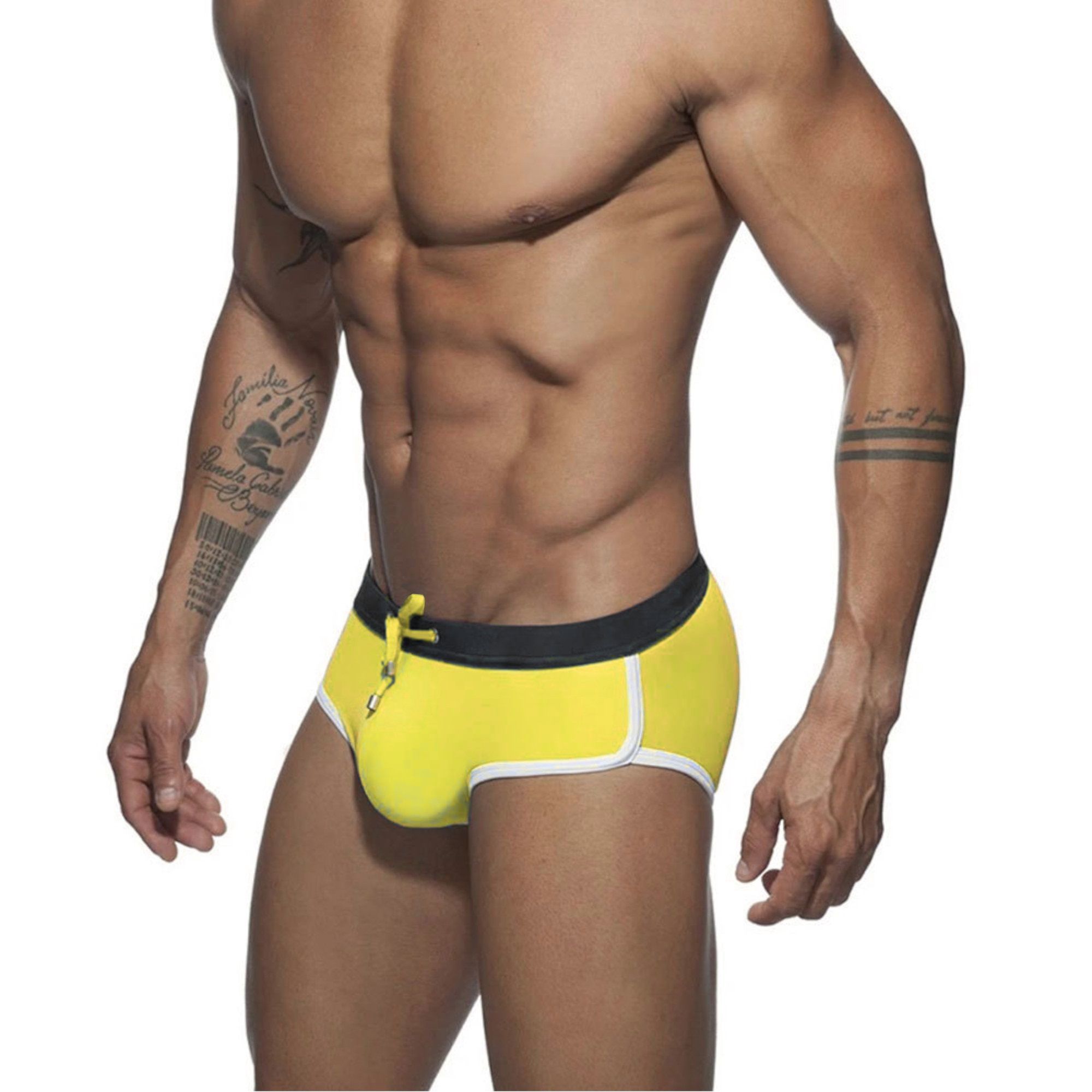 Желтые мужские плавки-брифы с контрастной отделкой 2