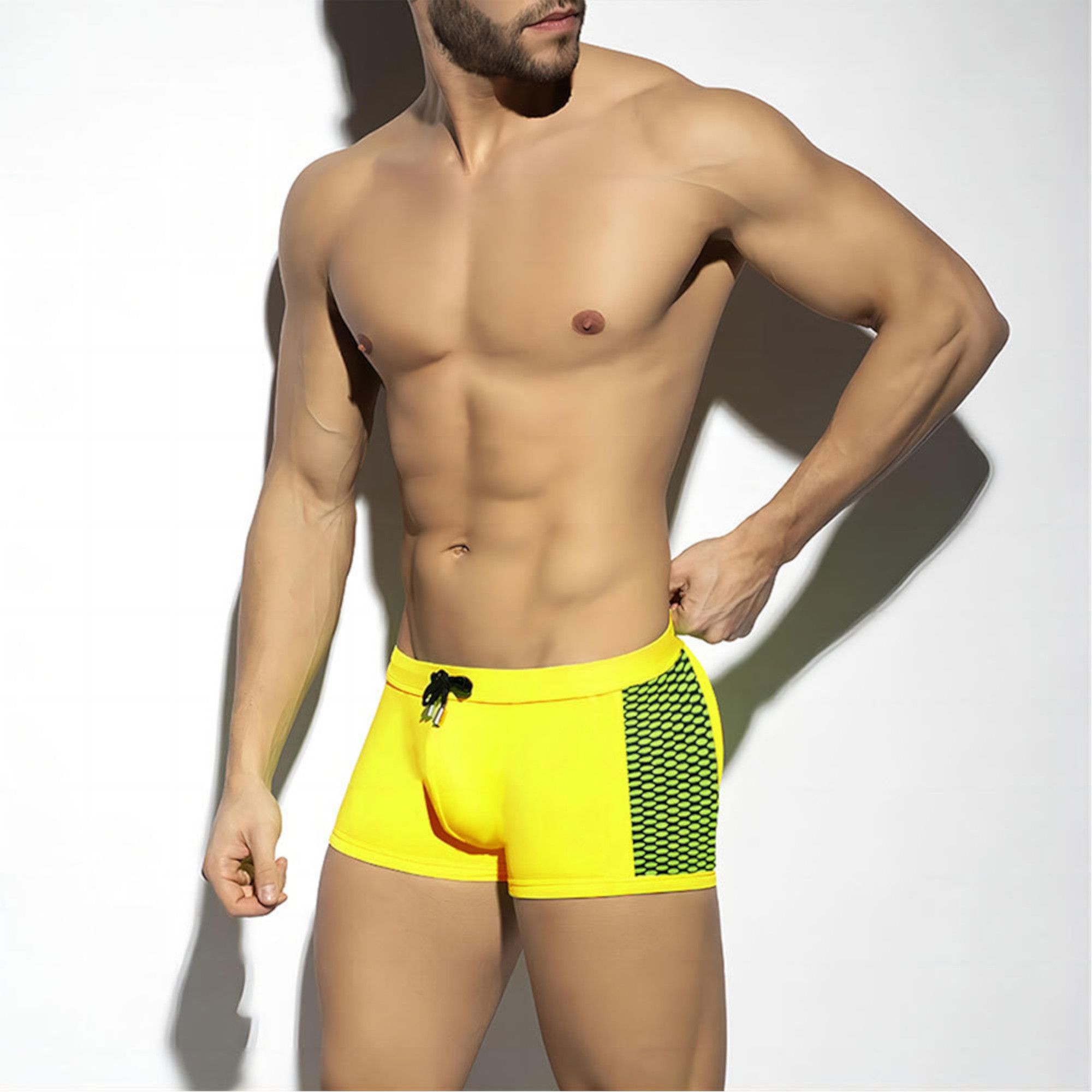 Желтые мужские плавки-боксеры с принтованными вставками по бокам 1