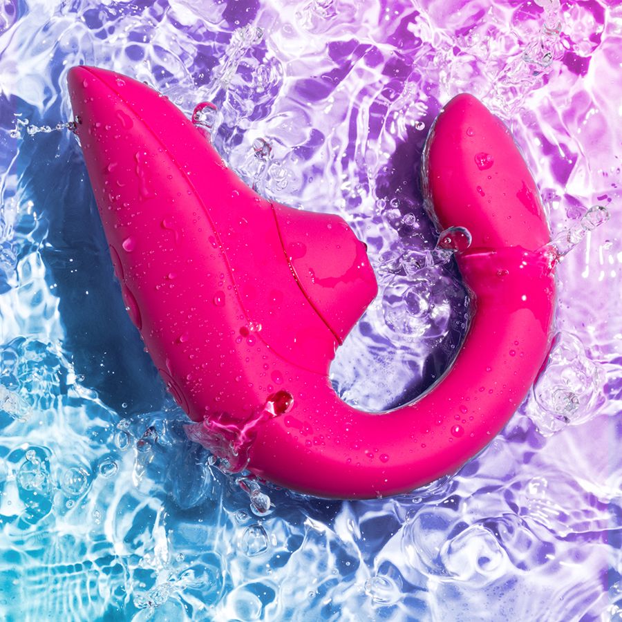 Малиновый вибромассажер для двойной стимуляции Womanizer Blend 10