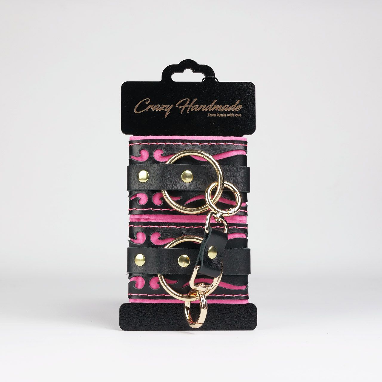 Черные кожаные наручники с розовой строчкой 2