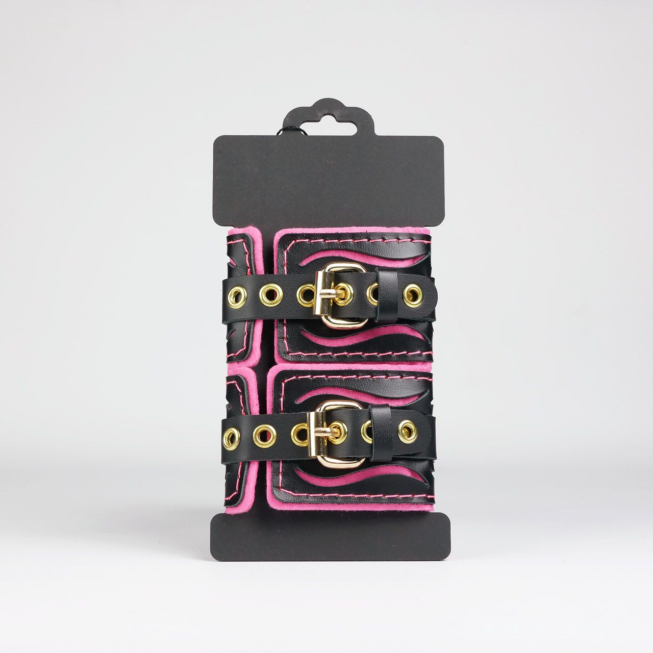 Черные кожаные наручники с розовой строчкой 3