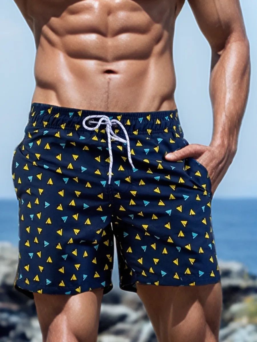 Темно-синие пляжные шорты с принтом и боковыми карманами 1